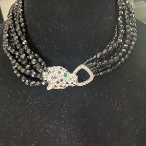 Elegant Black Beaded Necklace with Silver Panther Clasp